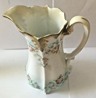 ANTIQUE R.  S.  PRUSSIA HAND PAINTED FOOTED SYRUP PITCHER WITH GOLD TRIM 6 