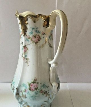 ANTIQUE R.  S.  PRUSSIA HAND PAINTED FOOTED SYRUP PITCHER WITH GOLD TRIM 6 