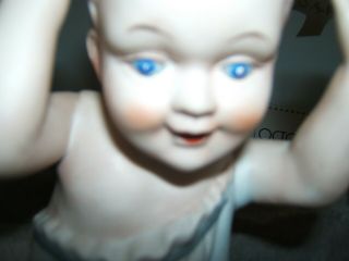 porcelain/bisque piano babies girl and boy 3