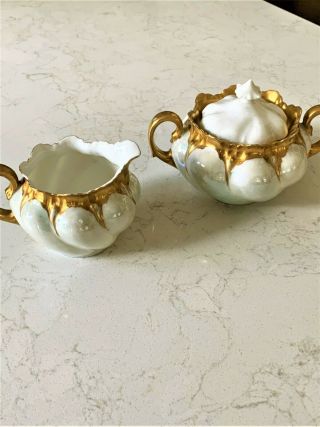 Set Of 2 Antique Sugar & Creamer With Heavy Gold.