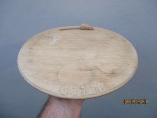An Antique Bread Board With Applied Mouse C1900