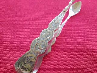 Lovely antique solid silver sugar tongs with engraved decoration Birmingham 1897 3