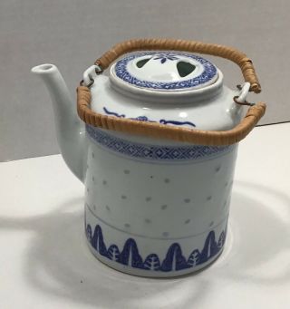 Porcelain Tea Pot In Blue And White Rice (dragon Eye) With Bamboo Copper Handles