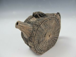 A Chinese Clay Carved Wood Shape Teapot With Cicada