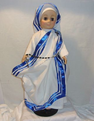 Vintage Vinyl Nun Doll With Blue & White Robe,  Ring,  Rosary,  Glasses & Sandals