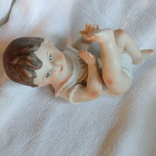 Vintage Piano Baby Brunette Boy Lying on Back Feet Up Porcelain Bisque Figurine 3