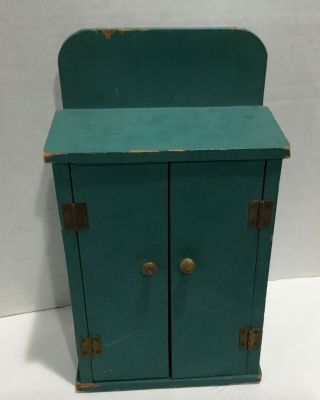 Small Primitive Two Door Wooden Cabinet In Green Paint
