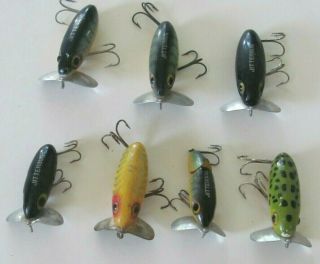 7 vintage fishing lures Fred Arbogast Jitterbugs different sizes and colors 2