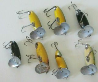 7 vintage fishing lures Fred Arbogast Jitterbugs different sizes and colors 3