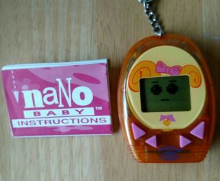 1997 Rare Talking Nano Baby Electronic Game Keychain Playmate Toys W/instruction