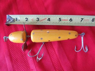 Vintage Yellow/gold Dots Pflueger Globe Muskey Lure - Bulldog Stamp - Front Spinning