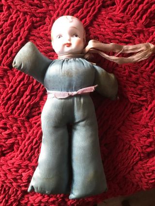 Antique Pin Cushion Doll With Porcelain Head And Satin Body