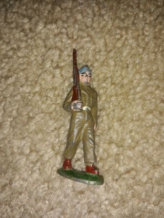Vintage Painted Cast Iron Metal Toy Army Soldier Marching With Rifle Rare