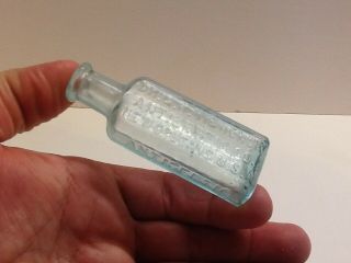 Small Antique Fully Embossed Dr.  G.  H.  Tichenor Antiseptic Sample Bottle, .