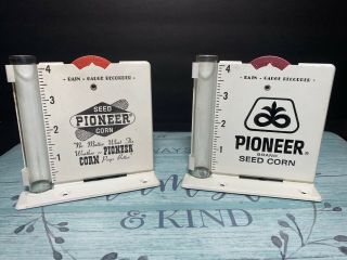 2 Vintage Pioneer Seed Corn Rain Gauges Rare
