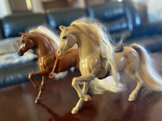 Two Vintage Barbie Doll Horses With Saddles.