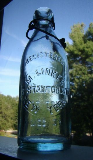 Antique M.  Linker - 8 Stanton St. ,  York Squat Blob Top Soda Bottle
