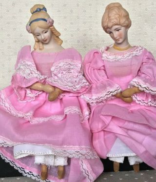 Two (2) Vintage Shackman Dolls Porcelain Heads,  Wooden Articulated Limbs 10 "
