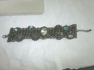Antiqued Brass Tone Linked Bracelet With Rhinestone Buttons And Charm Accents