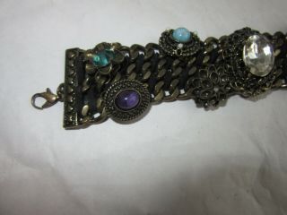 Antiqued brass tone linked bracelet with rhinestone buttons and charm accents 2