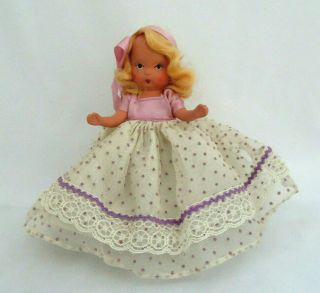 Nancy Ann Storybook Bisque Porcelain Doll Lavender Jointed Arms Frozen Legs