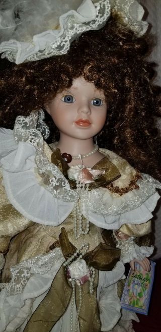 Cathay Porcelain Victorian Dress Doll - Brown Curly Hair - Blue Eyes
