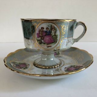 Vintage Royal Crown Iridescent Footed Tea Cup Saucer Blue - Green With Gold Trim