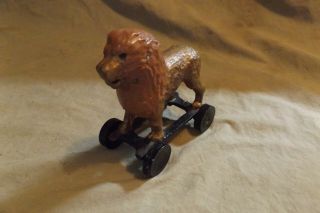 Vintage Antique Cast Iron Metal Lion Toy On Rolling Wheels Primitive