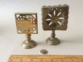 Two Antique Brass Miniature Tilt Top Tables/ Trivets.  Cast Bases.  One Pressed Top