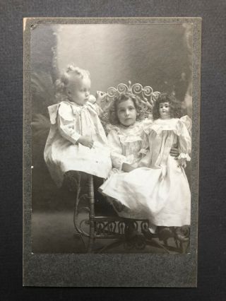 Girl Child Holding Large Doll Antique Cabinet Photo