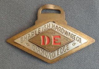 Antique Vintage Watch Fob De Shapleigh Hardware Co Diamond Edge Brass Enamel
