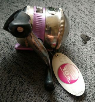 Zebco 33 Lady Push Button Fishing Reel With Tags.