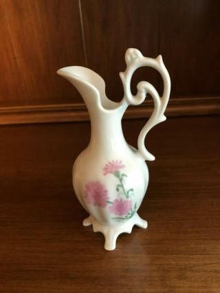 Small Porcelain Pitcher With Fancy Handle And Floral Design Signed