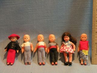 6 Small Vintage Celluloid / Early Plastic,  Sleepy Eye Dolls,  Home Made Clothes