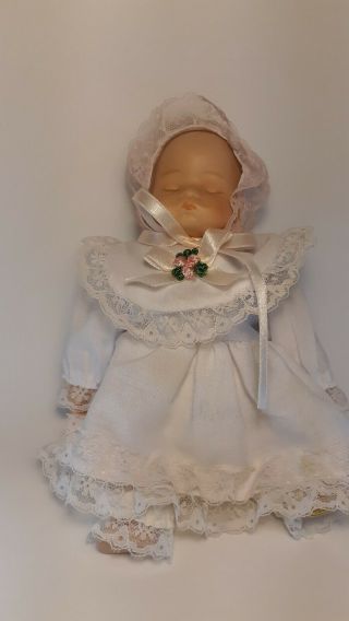 Porcelain Baby Doll Small Cloth Body,  Porcelain Head,  Hands.  Feet