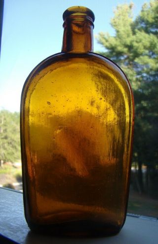 Antique Early Strap Sided Half Pint Orange - Amber Whiskey Flask