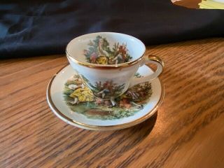 Vtg Mini Tea Cup Demitasse& Saucer Colonial Couple Scene Gold Trim