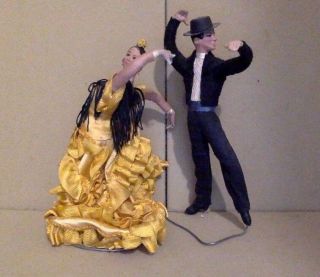 Two Vintage Cloth Dolls.  Spanish Man And Woman On Wire Stands.  7 " Tall.