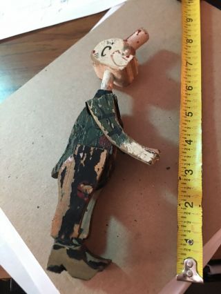 antique wooden toy from the 30 ' s,  hinged at shoulders and hips 3
