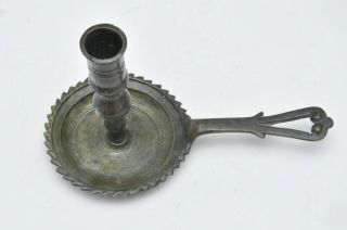 Unusual Antique Bronze Candlestick With Saw Teeth Base