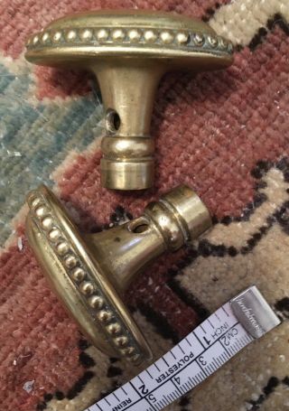 Two oval Antique 2.  9 inch bronze brass door knobs 2