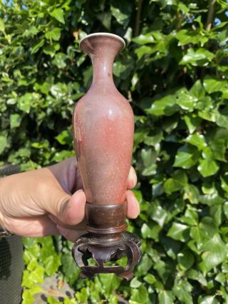 A rare 19th century Chinese copper red glaze vase & wood stand 2