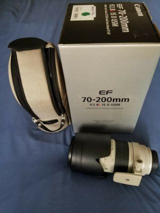 Canon EF 70 - 200mm f/2.  8 L IS II USM Lens.  Rarely but small dent. 2