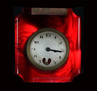 A Rare Art Deco Catalin Faux Cherry Amber Faturan Bakelite Clock 1920s