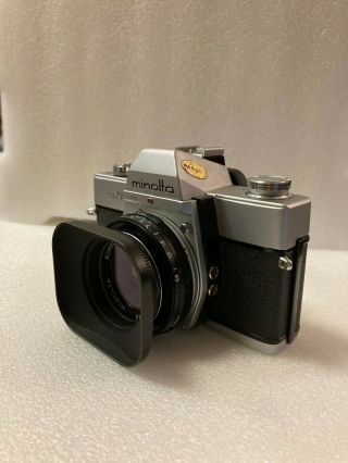 CLA ' d Minolta Rokkor - TD 45mm 2.  8 MF Pancake Lens with Hood (Very Rare Lens) 2