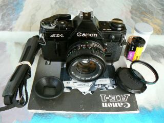 Canon Ae - 1 Black Camera W/ Canon 50mm F1.  8 Serviced 35mm Slr Camera Rare Ex,