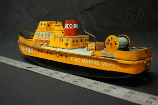 Marusan F100 Yellow Fire Marine Dept.  Tin Boat Made In Japan 1950 