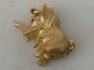 A VERY RARE 9ct SITTING DOWN ELEPHANT WITH RUBY EYES CHARM 5grms (Georg Jensen) 2