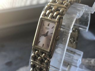Vintage Seiko Ladies Stainless Steel Gold Tone Quartz Watch With Pink Dial