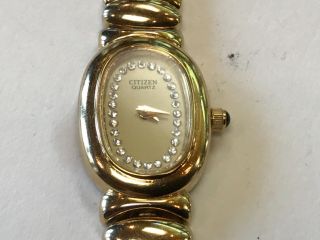 Ladies Citizen Quartz Gold Tone Face & Band With Clear Gems Circling The Face